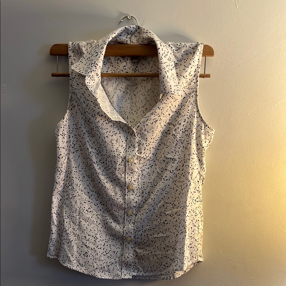 White and Black Sleeveless Button-Up Top